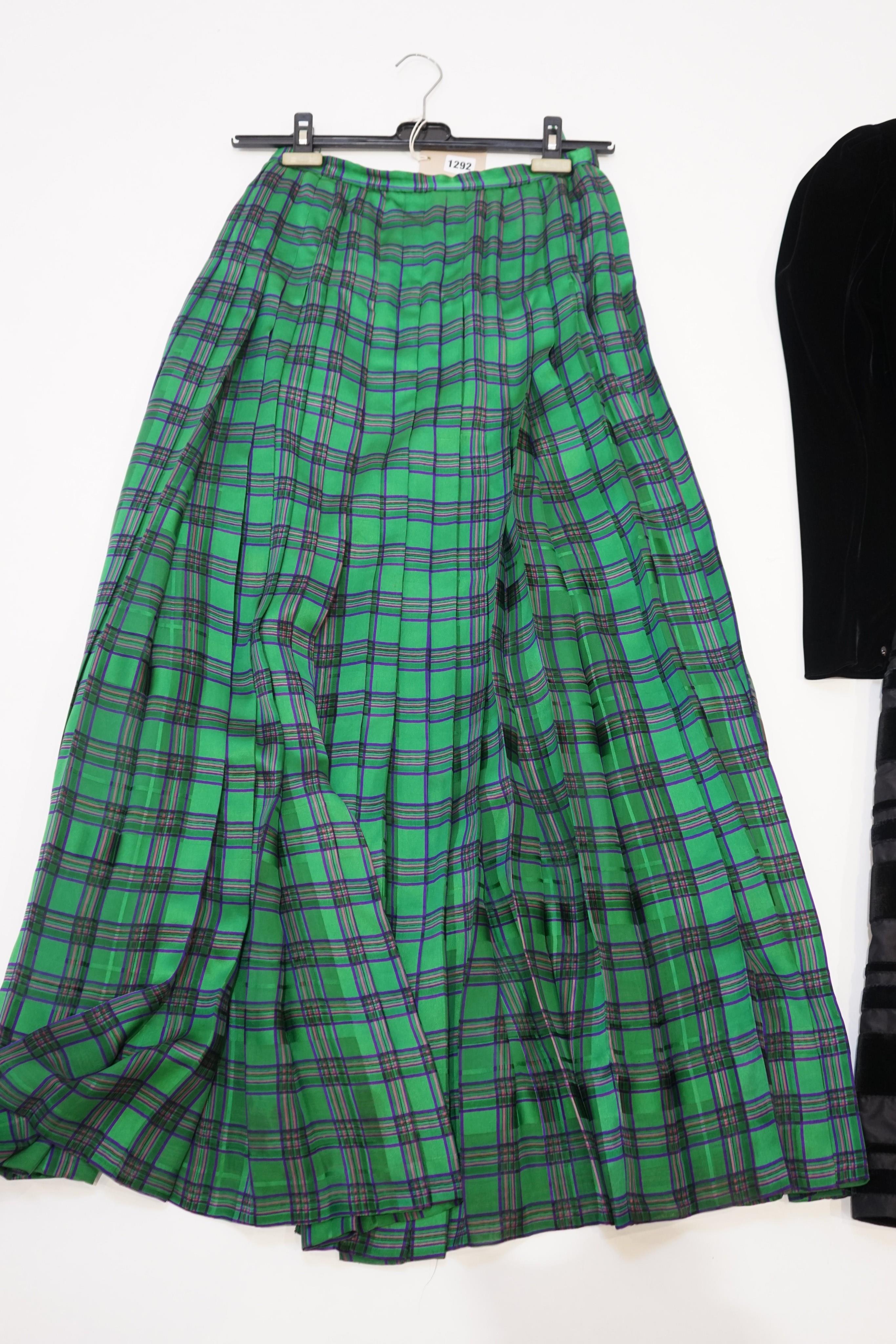 Christian Dior. A pleated long tartan pattern silk skirt, size ‘small/medium’ and a velvet and satin mid length evening dress, no size given, estimated at medium